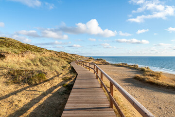 Wooden pier along the beach on the island of Sylt, Schleswig-Holstein, Germany