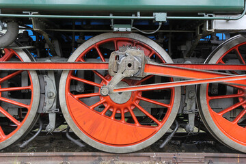 Bratislava, Slovakia. 2016/6/19. The wheel machinery of a locomotive. Exhibition of old locomotives and trains.