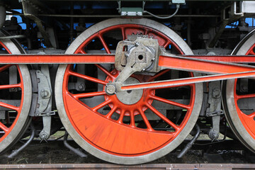 Fototapeta premium Bratislava, Slovakia. 2016/6/19. The wheel machinery of a locomotive. Exhibition of old locomotives and trains.