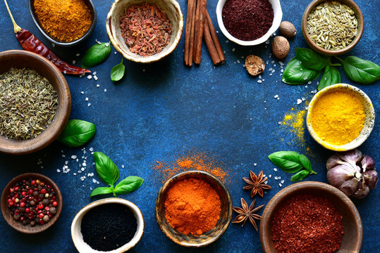 Assortment of natural organic spices in a bowls. Top view with copy space. © lilechka75
