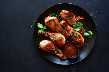 Grilled chicken legs. Top view with copy space.