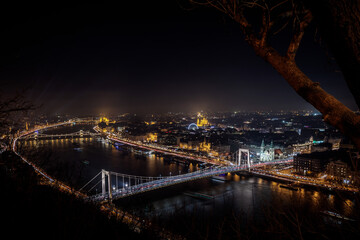 Stunning panoramic night view over the Chain Bridge crossing the Danube River in Budapest