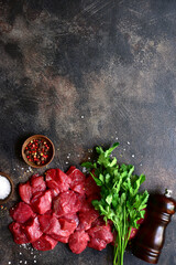 Raw organic meat ( beef or lamb ) . Top view with copy space.