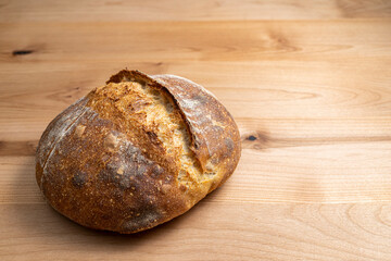 Freshly baked homemade loaf of sourdough bread