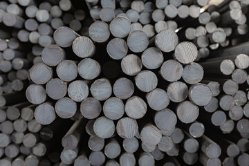 Many steel round bars in stock