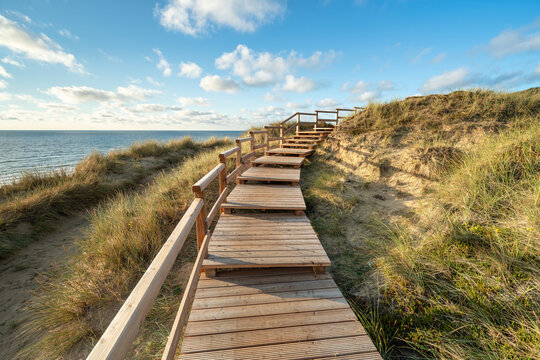 Walking along a path near the westcoast of Sylt, Schleswig-Holstein, Germany