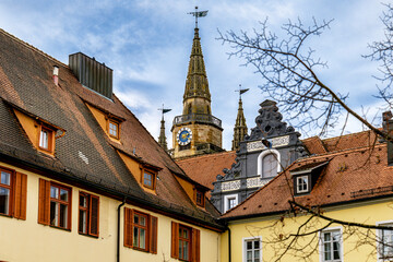 Fototapeta na wymiar Clocks on the tower of Sankt Gumbertus church, Ansbach