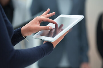 close up. digital tablet in the hands of a business woman