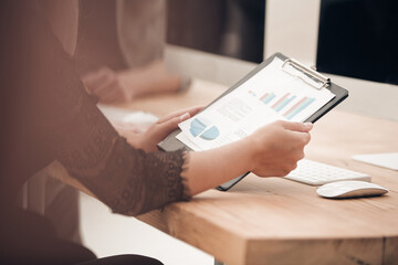 close up. business woman analyzing financial data