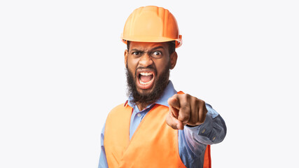Mad Builder Shouting Pointing Finger At Camera Over White Background