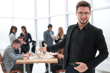 close up. confident business man standing in the office