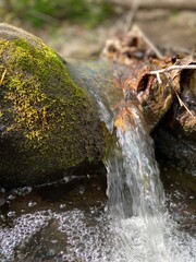 Stream through mossy rocks