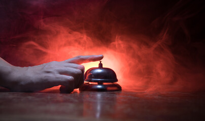 Hotel reception bell, service bell on the table, selective focus