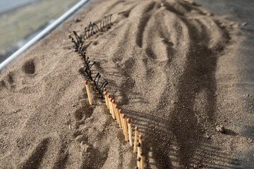 Social distancing concept showing how it can stop spreading of corona virus pandemic. One match with more distance stops burning of others.