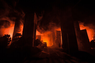 Empty street of burnt up city, flames on the ground and blasts with smoke in the distance....