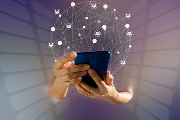 businessman holding smart phone with social network icons	