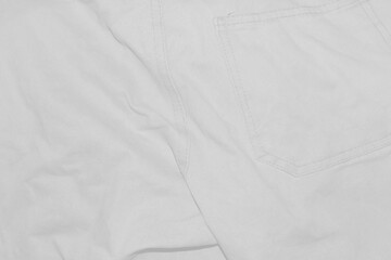 White fabric with stitches for the background