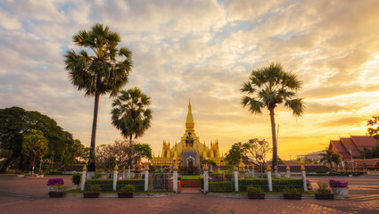 Pha That Luang Vientiane Golden Pagoda in Vientiane, Laos. sunset sky background beautiful.