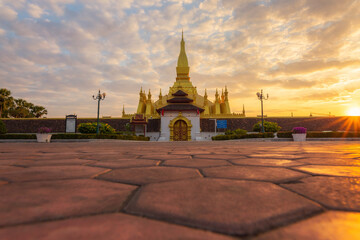 Pha That Luang Vientiane Golden Pagoda in Vientiane, Laos. sunset sky background beautiful.