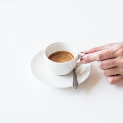cup of coffee in hand