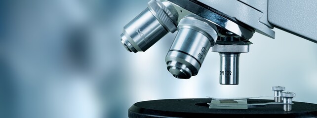 Scientific microscope with metal lens at the laboratory, Modern medical laboratory equipment