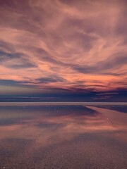 Fototapeta na wymiar fantastic sunset over a dry salt lake in Uyuni Bolivia