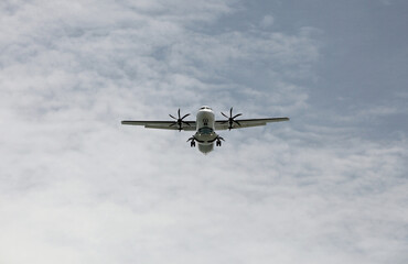 Fototapeta na wymiar Turboprop airliner coming in for landing