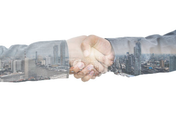 double exposure city and business people handshake for agreement success partner deal. partnership...