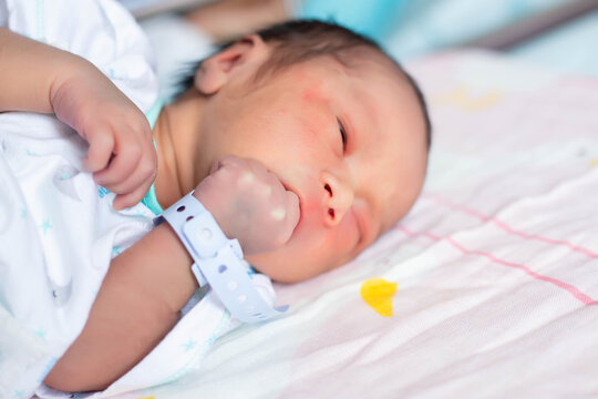 Small delicate little hand of newborn - close portrait