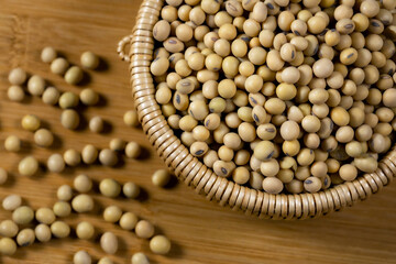 Soybeans in a wooden bowl on the table