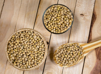 Soybeans in a wooden bowl on the table
