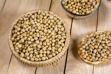 Soybeans in a wooden bowl on the table