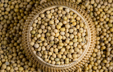 Soybeans in a wooden bowl on the table