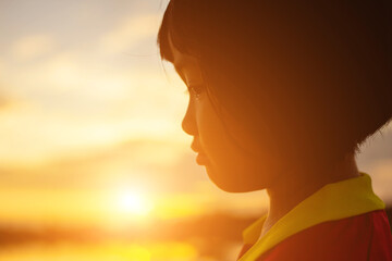 kid silhouette,Moments of the child's joy. On the Nature sunset