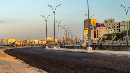 03. 03. 2020. Havana, Cuba. Sunset over the streets of the vibrant city along the sea side road also know as  El Malecon.