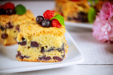 Berry coffee cake cut into squares.