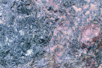 Rock is magnetite ore. Mineral content - iron, magnesium oxide. Fragments of microsyenites, limestones, granites. Textures - spotted, breccia, collomorphic. Colour - Midnight, Prelude, Hue Violet.