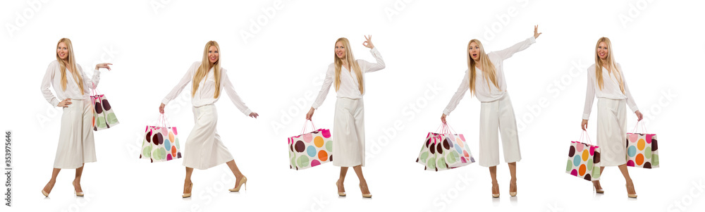 Wall mural woman with shopping bags on white