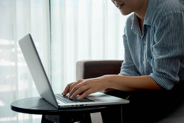 Working online at home, on vacation, on-line meetings Creating an online business from home using a laptop and smart phone