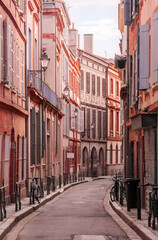 Fototapeta na wymiar Street of the old european city in the early morning