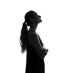 Female person silhouette in the shadow, back lit light