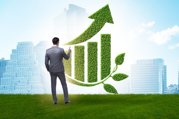 Green economy growth concept with businessman