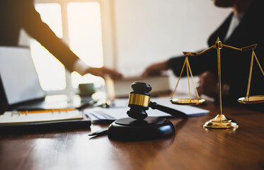 Justice and law concept. Weight scale of justice, The lawyer works at the office desk to give advice on law and justice.