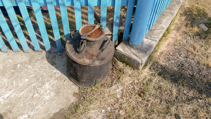 old iron barrels on the street
