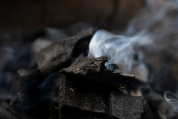 Start burning of charcoal with smoke. Prepare for general cooking.