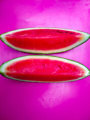 Slices of watermelon fruit isolated on pink background. Watermelon clipping path