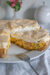 Home made rhubarb meringue cake on a plate
