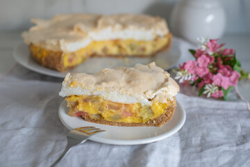 Home made rhubarb meringue cake on a plate