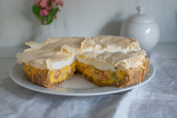 Home made rhubarb meringue cake on a plate