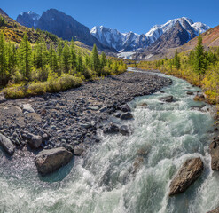 Picturesque mountain landscape, Altai, Russia. Gorge with a mountain river, rocky slopes,...